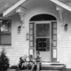 Jim Morice (left) and his two brothers sit on the front porch of their house in Ferguson, Missouri.